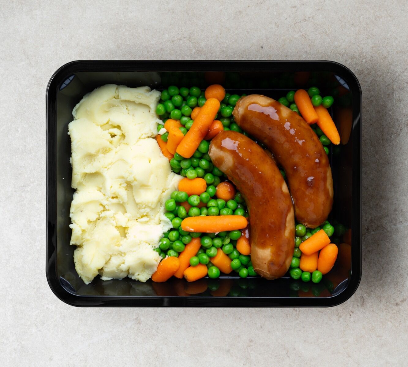 Kartoffelpüree - Hühnerwurst - Erbsen und Möhren (mit Soße)
